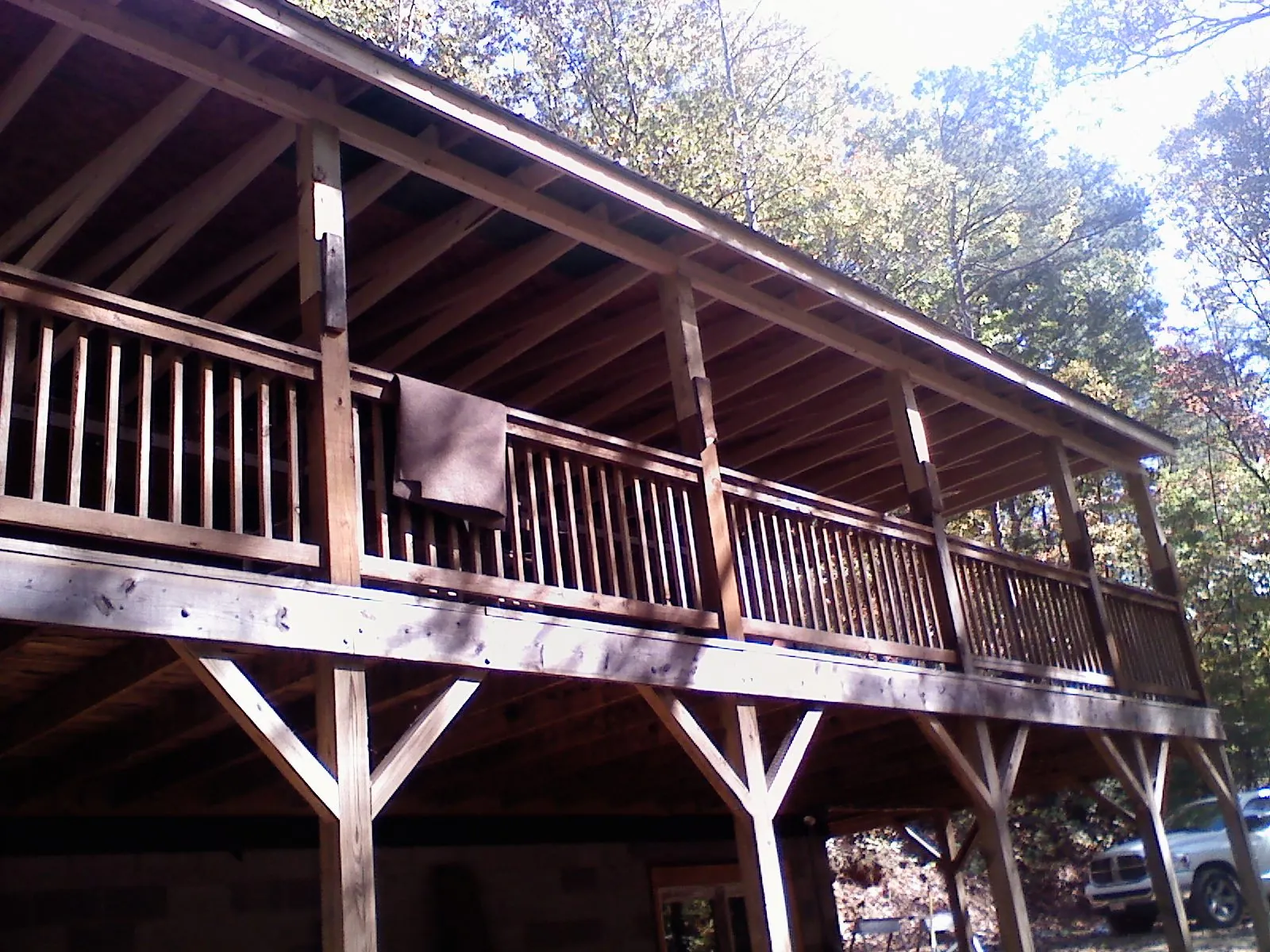 Timber framing under a new elevated porch and deck — Roof Leak Repair in Line Lexington by Roofing Brothers